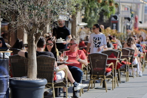 People relaxing at a terrace 1